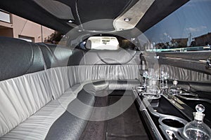 A grey and black interior limo car