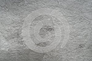 Grey black slate stone background or texture photo