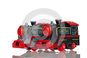 grey and black toy trains, locomotives isolated on a white background