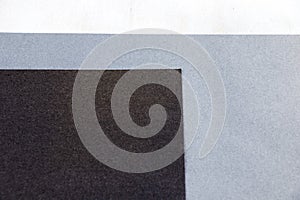 Grey, black and white papers background and texture