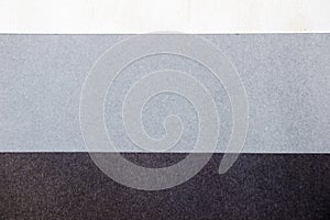 Grey, black and white papers background and texture