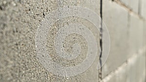 Grey blocks concrete wall. Old gray concrete or cement wall textured background