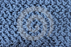 Grey blue messy knitwork close-up