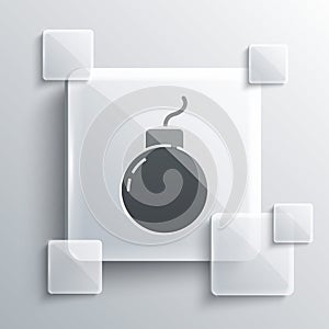 Grey Bomb ready to explode icon isolated on grey background. Square glass panels. Vector