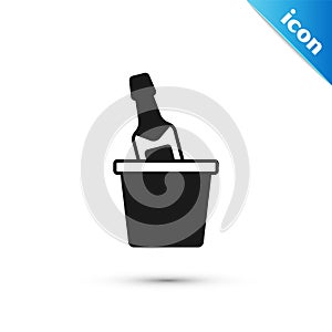 Grey Bottle of champagne in an ice bucket icon isolated on white background. Vector