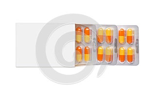 Grey box with orange pills in a blister pack