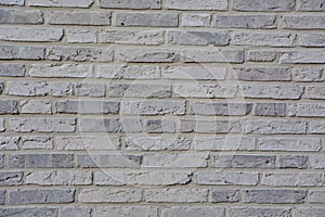 Grey brick stone wall texture grunge background;