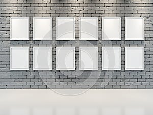 GREY BRICK WALL with frames for paintings