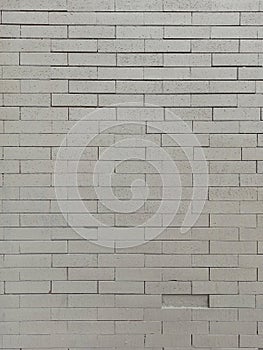 Grey Brick Wall texture Background old and grainy backdrop