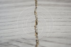 Grey broken plywood board texture background