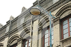 Grey buildings and street lights