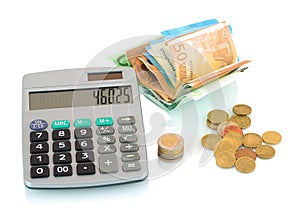 Grey calculator, Euro bills and coins isolated on white background with shadow reflection. Money concept.