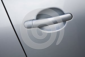Grey car door handle