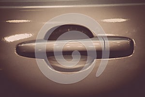 Grey car door handle