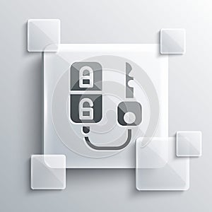 Grey Car key with remote icon isolated on grey background. Car key and alarm system. Square glass panels. Vector