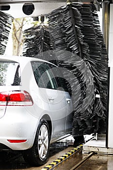 Grey car during washing process