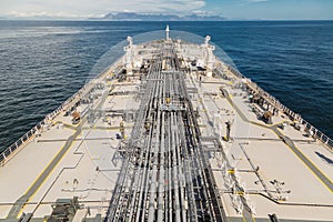 Grey cargo deck of a big oil tanker