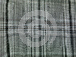 Grey checkered fabric background, close up