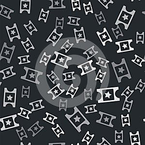 Grey Cinema ticket icon isolated seamless pattern on black background. Vector