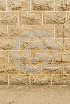 Grey clinker wall with pavement