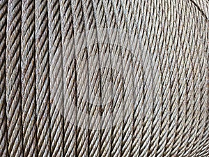 Grey coil of steel metal rope