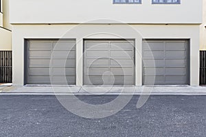 Grey colored three car garage