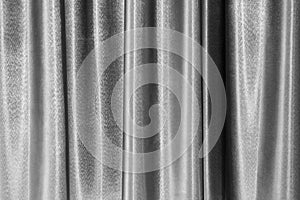 Grey curtain texture pattern background with fabric vintage style, backdrop gray drape surface curve decorative