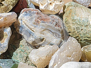 Grey and dark multicolored Agate, transparent quartz and Corallites, Natural treasure. photo