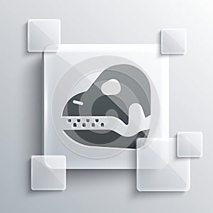 Grey Dinosaur skull icon isolated on grey background. Square glass panels. Vector