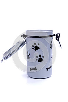 Grey doggy treat container with black pawprints