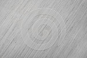 Grey fabric texture. A gray background with a pattern of lines photo