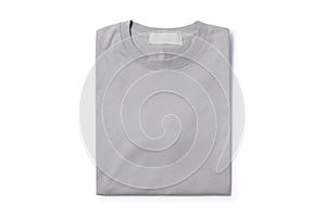 Grey folded t-shirt isolated on white background with clipping path.