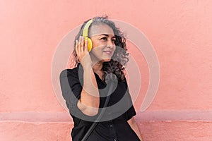 Grey-Haired Woman Listening To Music And Dancing