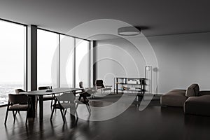 Grey home living room interior with eating table and relax corner, window