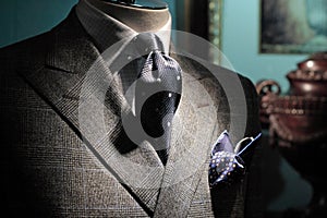 Grey jacket, dark blue tie and handkerchief photo