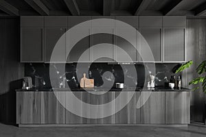 Grey kitchen interior with hidden shelves and minimalist kitchenware