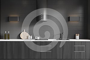 Grey kitchen interior with shelves and minimalist kitchenware