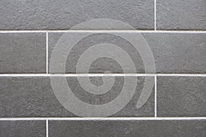 Grey large tile textured background white grout