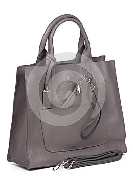 Grey leather woman's handbag with strap isolated on white background