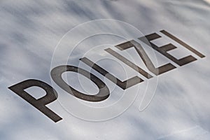 Grey lettering `Polizei` on silver bonnet photo