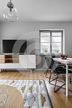 Grey living room with table