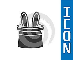 Grey Magician hat and rabbit ears icon isolated on white background. Magic trick. Mystery entertainment concept. Vector