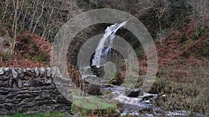 Grey Mare`s Tail Waterfall and burn in winter, Galloway Forest Park, Scotland