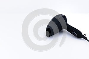 Grey mat hair dryer on the white background with copy space