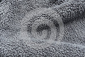 Grey microfiber fabric texture for background. view from above. Close up Micro fiber cloth