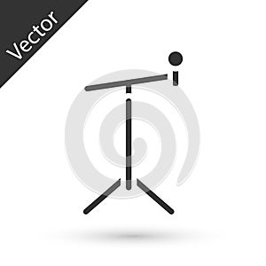 Grey Microphone with stand icon isolated on white background. Vector
