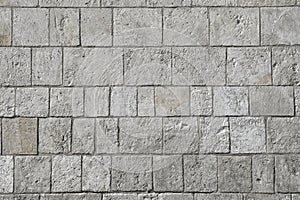 Grey modern coble stone background. Close up top view on monotone gray brick stone. Sidewalk or pavement