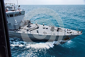 Grey modern warship aerial view.