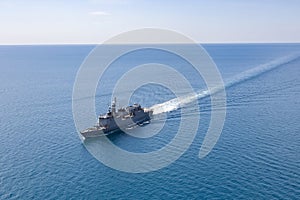 Grey modern warship aerial view.