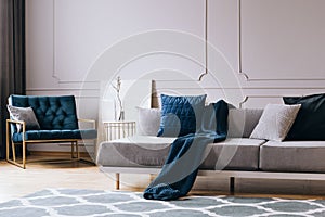 Grey living room interior with blue accents photo